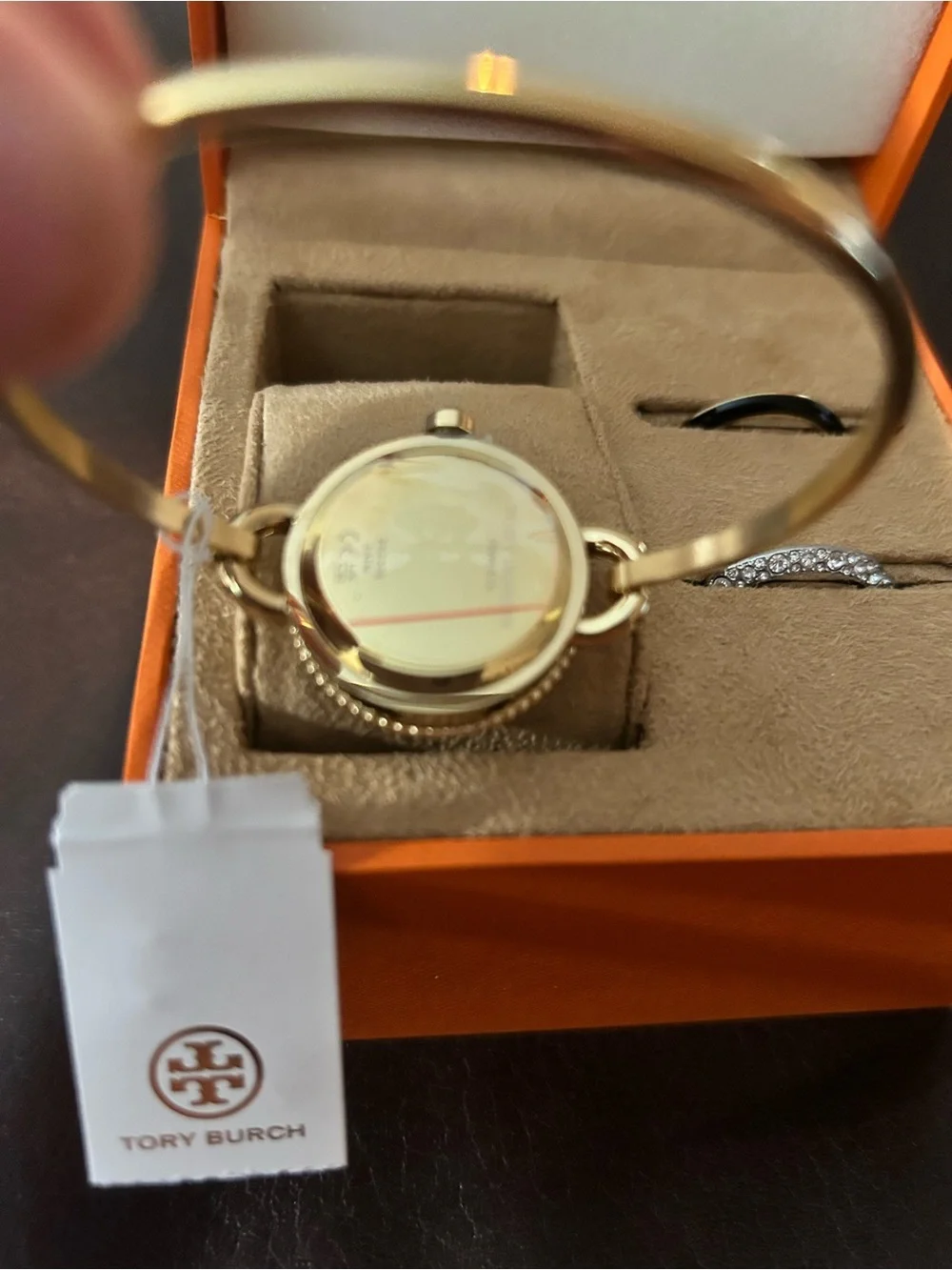 Tory Burch Gold-Tone Logo Dial Bangle Watch with White Face